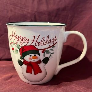 Cheerful Christmas cup by Pfaltzgraff with snowman saying Happy Holidays.